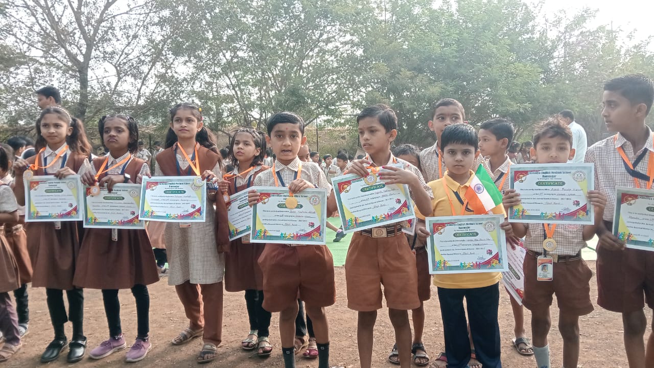 Chaitanya school students holding certificates and medals
